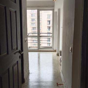 Building Lobby in 3 BHK Apartment at Unitech Escape, Rosewood City – for Rent