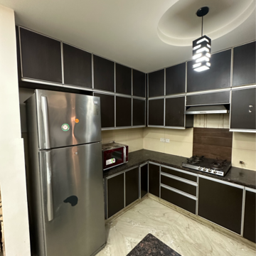 Kitchen in 4 BHK Apartment at Anand Niketan CGHS, Sarswati Kunj ii – for Rent