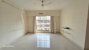 Living Room in 2 BHK Apartment at Modispaces Doyle, Malad West – for Sale