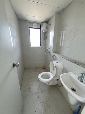 Bathroom in 3 BHK Apartment at Runwal Gardens, Dombivli East – for Rent