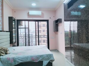 Bedroom in 2 BHK Apartment at Raheja Heights Phase 2, Goregaon East – for Rent