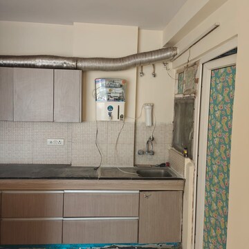 Kitchen in 3 BHK Apartment at Amrapali Royal, Vaibhav Khand – for Rent