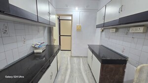 Kitchen in 2 BHK Apartment at Atlanta CHS, Malad West – for Rent