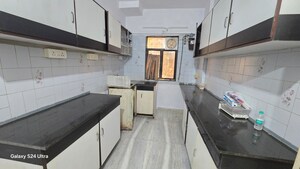 Kitchen in 2 BHK Apartment at Atlanta CHS, Malad West – for Rent
