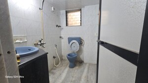 Bathroom in 2 BHK Apartment at Atlanta CHS, Malad West – for Rent