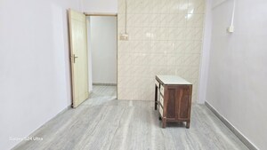 Bedroom in 2 BHK Apartment at Atlanta CHS, Malad West – for Rent