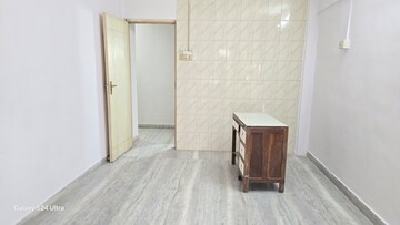 Bedroom in 2 BHK Apartment at Atlanta CHS, Malad West – for Rent