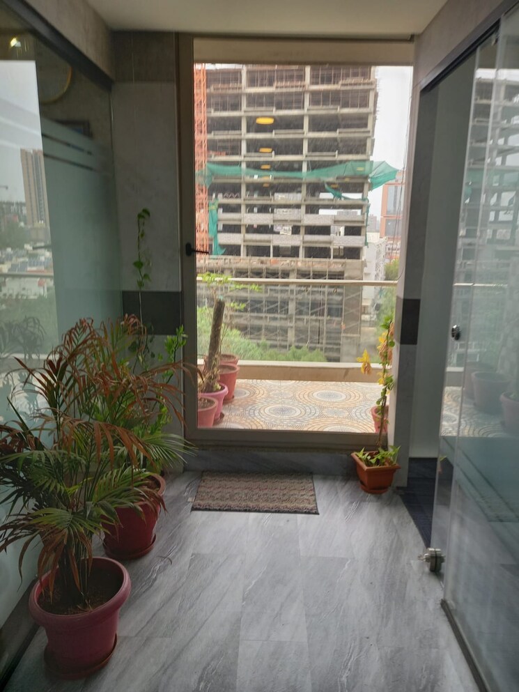 Balcony, sheladia-one-world-west Commercial Office Space 2600 Sq.Ft. In Ambli Ahmedabad 9846612