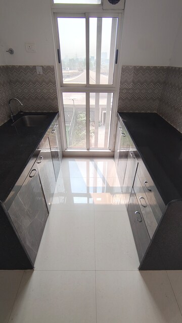 Kitchen in 2 BHK Apartment at Lodha Codename Premier, Dombivli East – for Rent