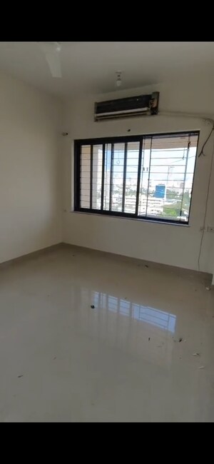 Bedroom in 2 BHK Apartment at K Raheja Palm Spring, Malad West – for Rent