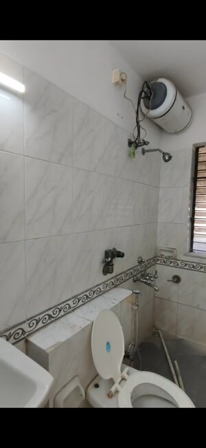 Bathroom in 2 BHK Apartment at K Raheja Palm Spring, Malad West – for Rent
