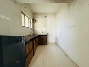Kitchen in 2.5 BHK Apartment at Paranjape Schemes Madhukosh, Dhayari – for Sale