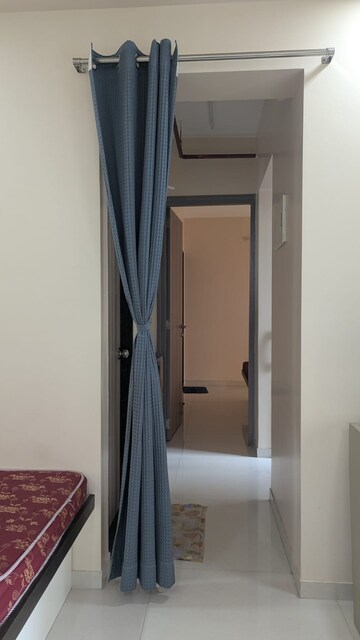 Master Bedroom in 1 BHK Apartment at Ashar Axis, Majiwada – for Rent