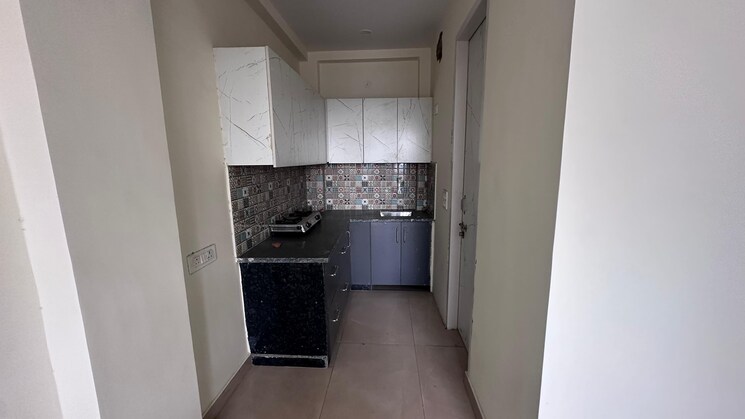 Kitchen, super-mig 1 Bedroom 750 Sq.Ft. Builder Floor In Sector 105 Noida 9870508
