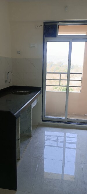 Kitchen in 1 BHK Apartment at Mahavir Kalpavruksha, Ghodbunder Road – for Rent