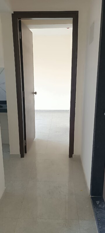 Building Lobby in 1 BHK Apartment at Mahavir Kalpavruksha, Ghodbunder Road – for Rent