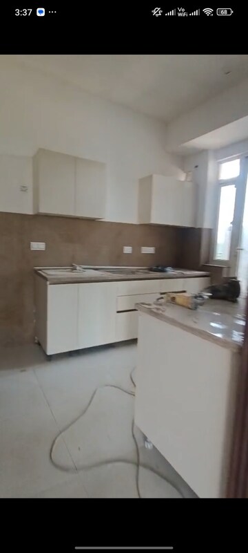 Kitchen in 3.5 BHK Apartment at Godrej Meridien, Sector 106 – for Sale