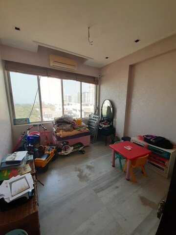 Living Room in 2 BHK Apartment at Daulat Shirin CHS, Colaba – for Sale