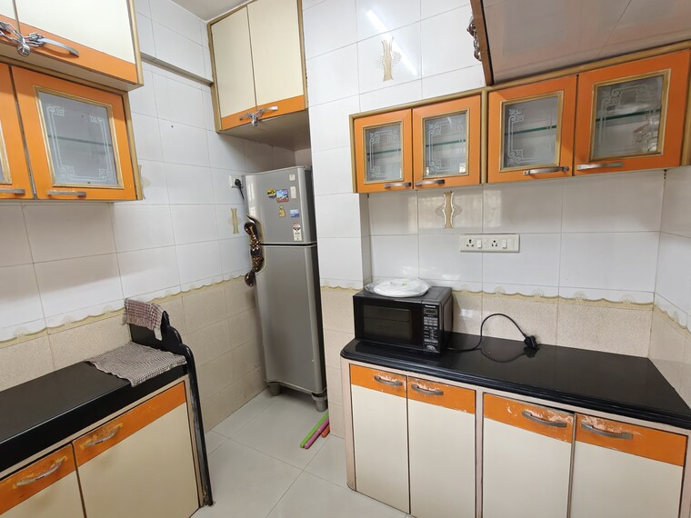 Kitchen, godrej-edenwoods 2 Bedroom 700 Sq.Ft. Apartment In Manpada Thane 9896396