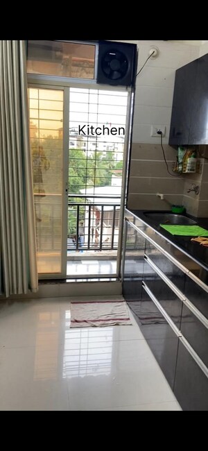 Kitchen in 1 BHK Apartment at Majiwada – for Sale