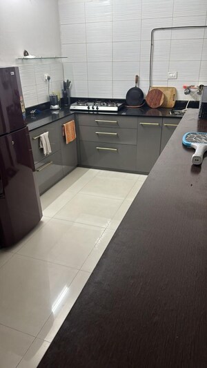 Kitchen in 2 BHK Apartment at Windwards CHS, Wakad – for Sale