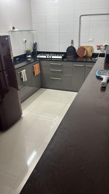 Kitchen in 2 BHK Apartment at Windwards CHS, Wakad – for Sale