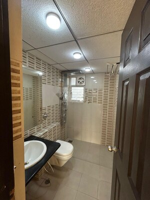 Bathroom in 4 BHK Apartment at NVT Life Square, Whitefield – for Rent