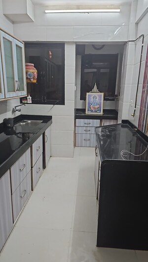 Kitchen in 2 BHK Apartment at Samudra Manthan CHS, Andheri West – for Rent