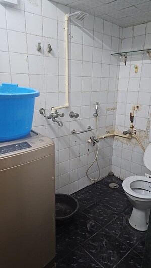 Bathroom in 2 BHK Apartment at Samudra Manthan CHS, Andheri West – for Rent