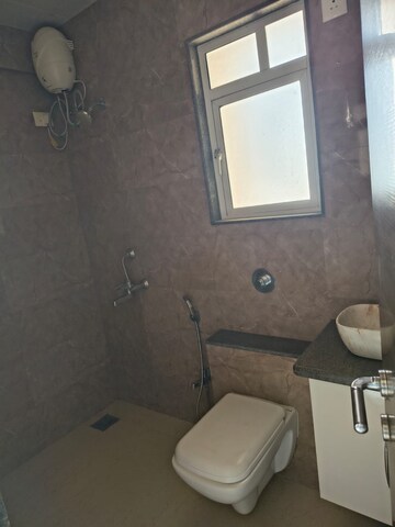 Bathroom in 1 BHK Apartment at Puranik Rumah Bali, Ghodbunder Road – for Rent