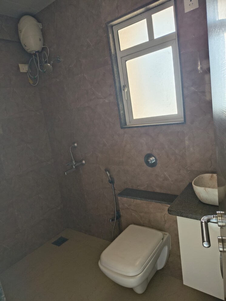Bathroom, puranik-rumah-bali 1 Bedroom 449 Sq.Ft. Apartment In Ghodbunder Road Thane 9930098