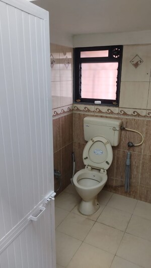 Bathroom in 1 BHK Apartment at Raheja Township, Malad East – for Rent