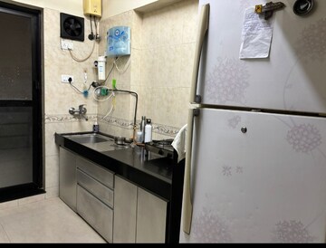 Kitchen in 2 BHK Apartment at Raheja Interface Heights, Malad West – for Rent