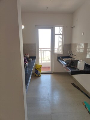Kitchen in 2 BHK Apartment at Sushant Golf City – for Sale