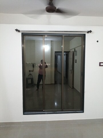 Living Room in 1 BHK Apartment at Beauty Landmark, Bhandup West – for Rent