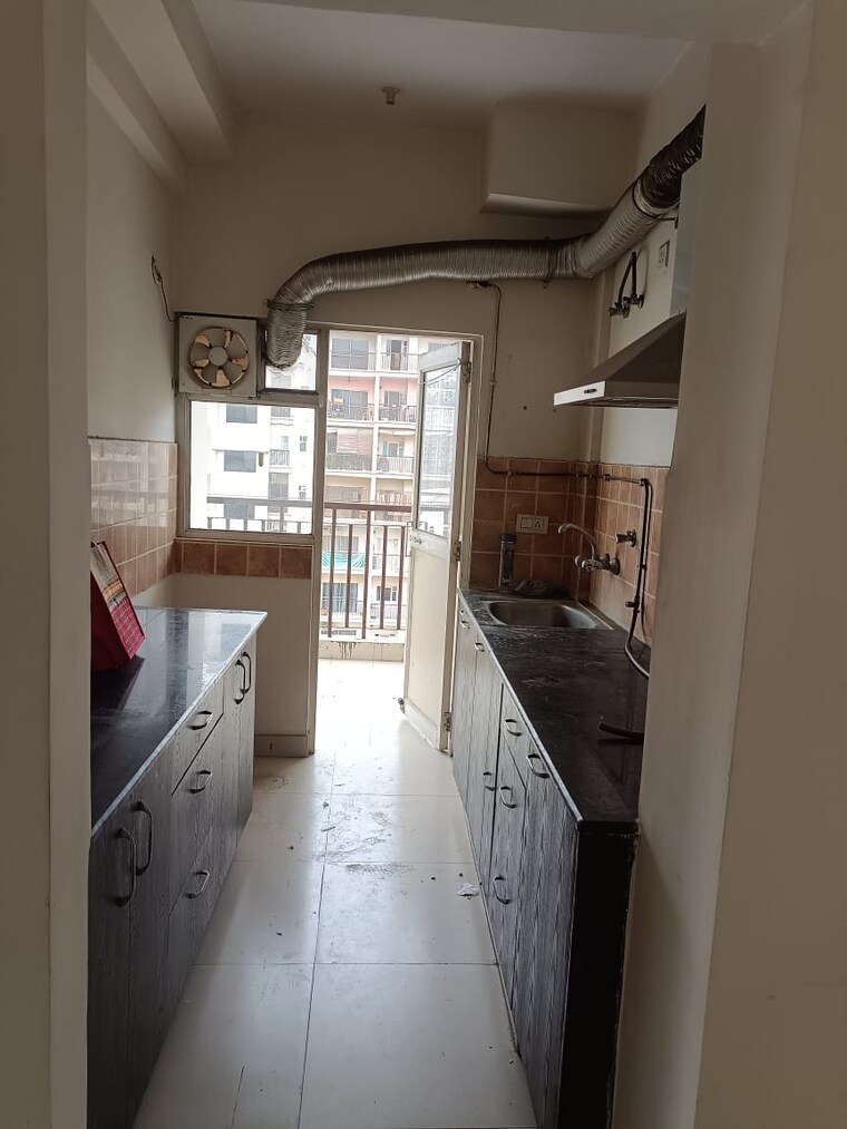 Kitchen, aims-golf-avenue-ii 2 Bedroom 930 Sq.Ft. Apartment In Sector 75 Noida 9961806