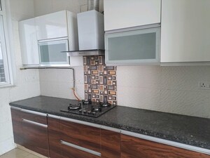Kitchen in 2.5 BHK Apartment at Central Park Resorts, Sector 48 – for Sale