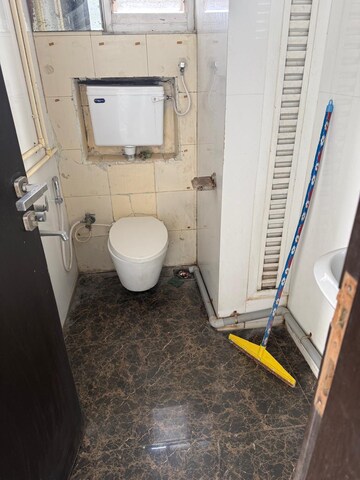 Bathroom in 2 BHK Apartment at Ruparel Iris, Matunga West – for Rent