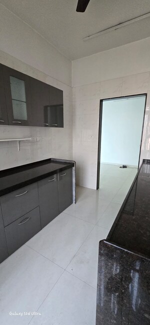Kitchen in 3 BHK Apartment at Shreeji Atlantis, Malad West – for Rent