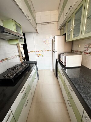 Kitchen in 2 BHK Apartment at Lodha Paradise, Majiwada – for Rent