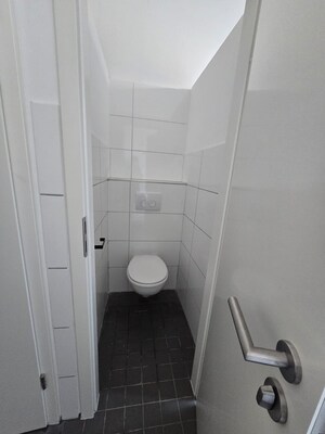 Bathroom in 1 RK Apartment at Shivalik Colony – for Rent