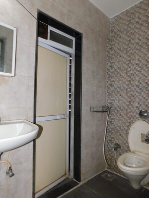 Bathroom in 1 BHK Apartment at Metropolis Bayside, Kasarvadavali – for Rent