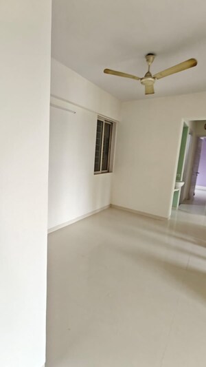 Room in 2 BHK Apartment at Chandak Boulevard 15, Malad East – for Rent