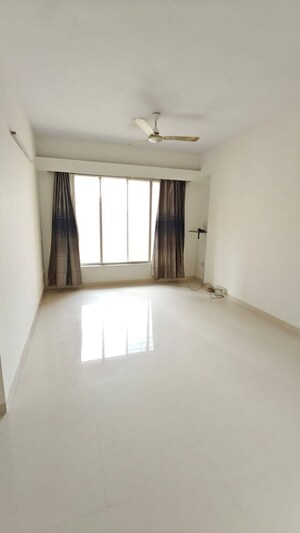 Room in 2 BHK Apartment at Chandak Boulevard 15, Malad East – for Rent