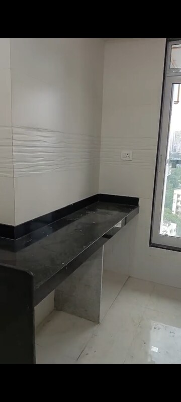 Kitchen in 2 BHK Apartment at Triumph Swastik, Malad West – for Sale