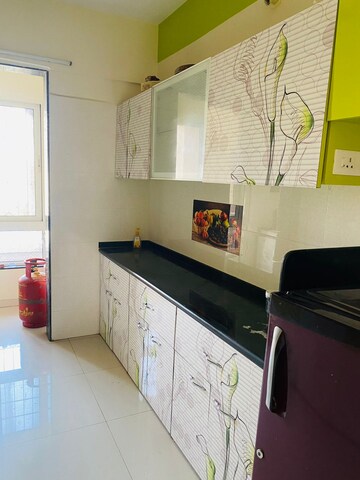 Kitchen in 3 BHK Apartment at Puranik Rumah Bali, Ghodbunder Road – for Rent