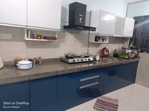 Kitchen in 2 BHK Apartment at Kumar Palmspring Towers, Undri – for Sale