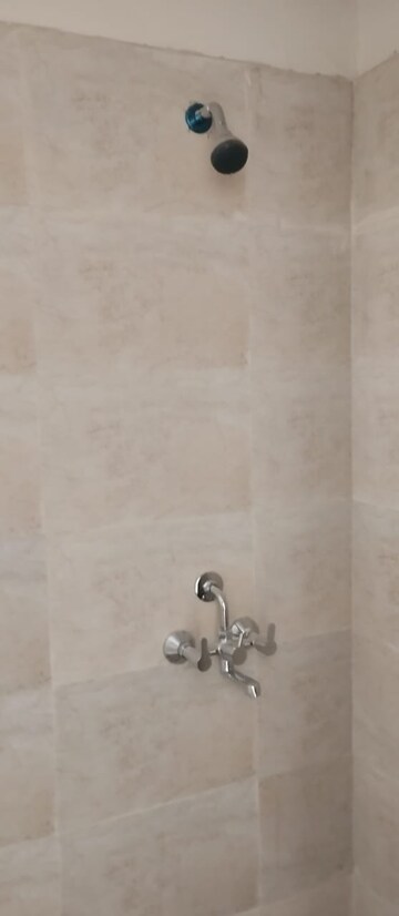 Bathroom in 3 BHK Apartment at Urban Axis Urban Woods, Sushant Golf City – for Rent