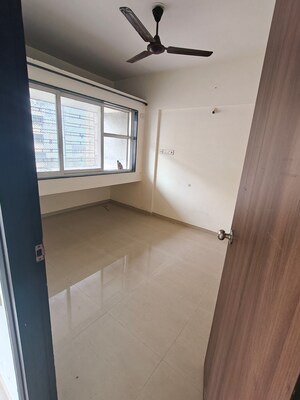 Room in 1 BHK Apartment at Spring Grove Uno Society, Kandivali East – for Rent