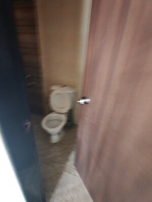 Bathroom in 1 BHK Apartment at Spring Grove Uno Society, Kandivali East – for Rent